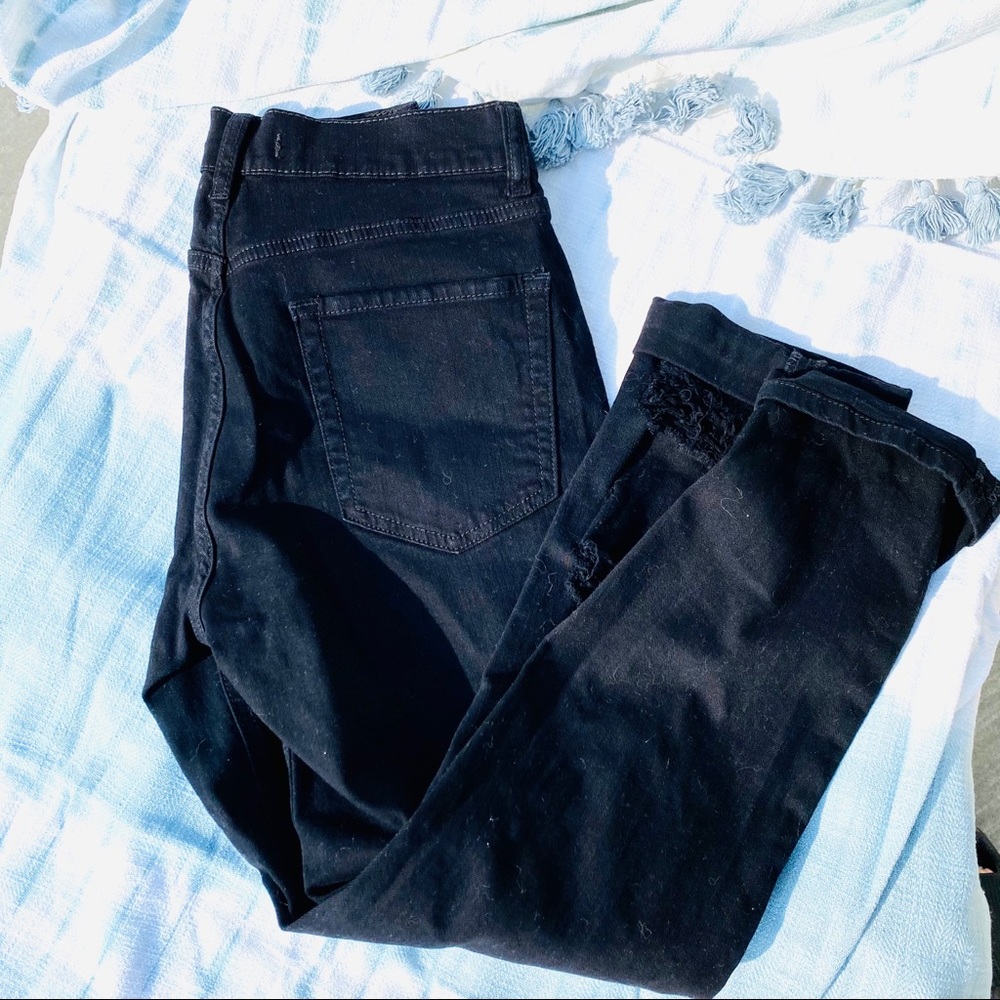 Distressed black jeans boyfriend